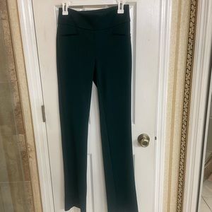 Dark green pull on slacks with elastic in the back. Gently worn. Machine wash.